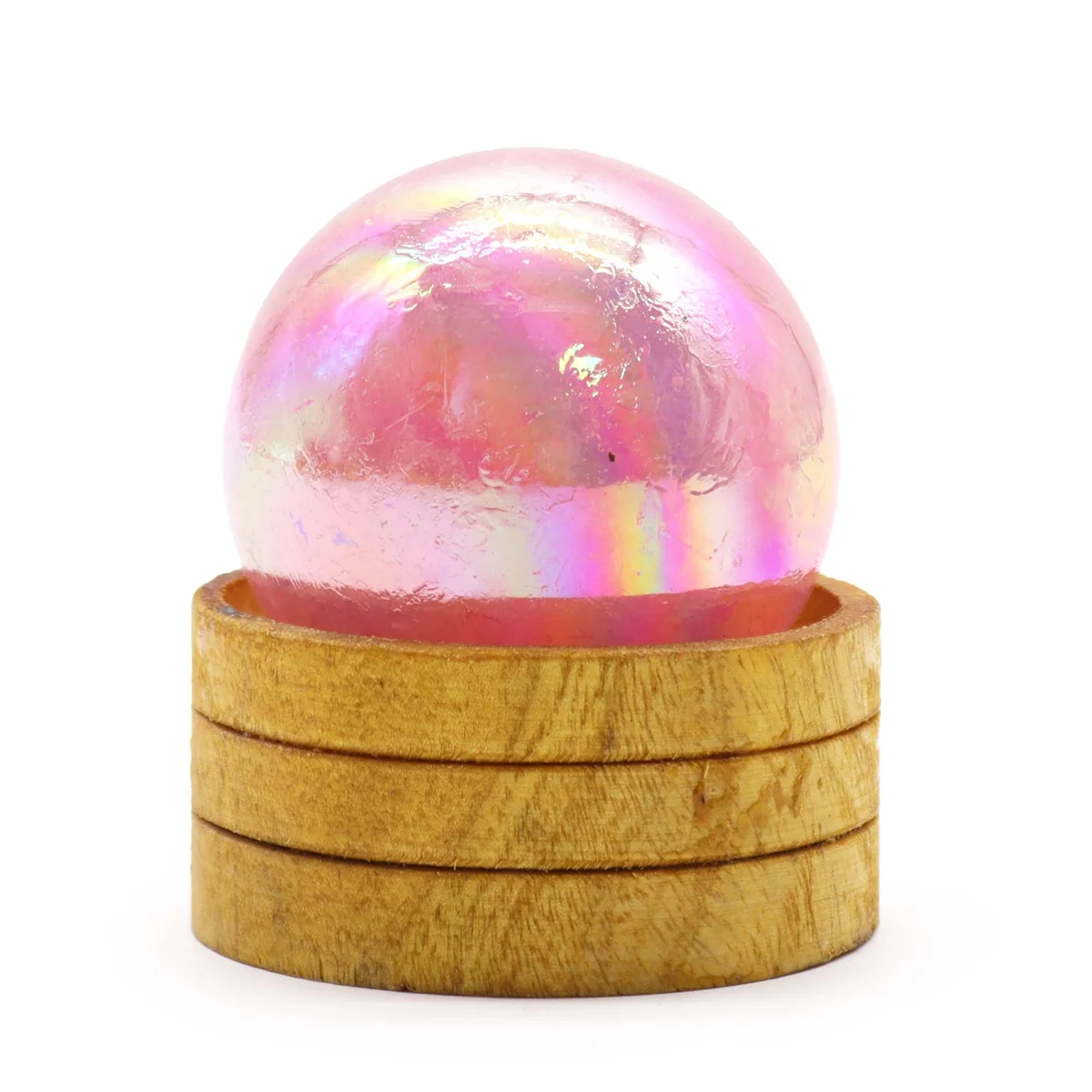 Rose quartz sphere resting on a titanium stand with a subtle glowing aura.