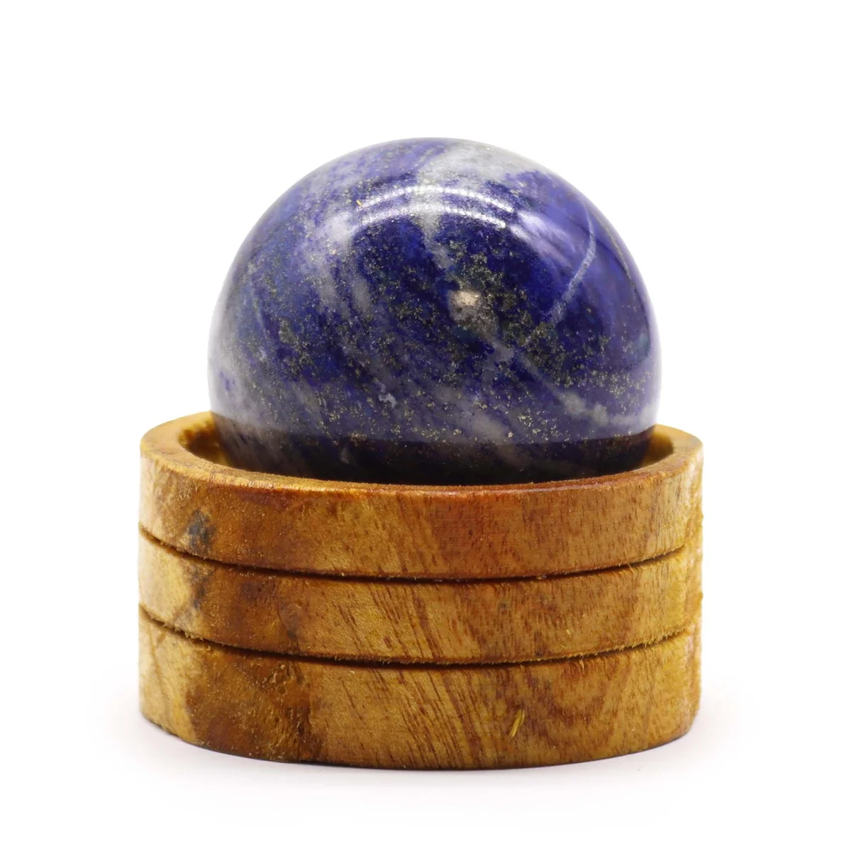Afghan lapis sphere 50mm resting on a simple stand, showcasing its deep blue sheen.