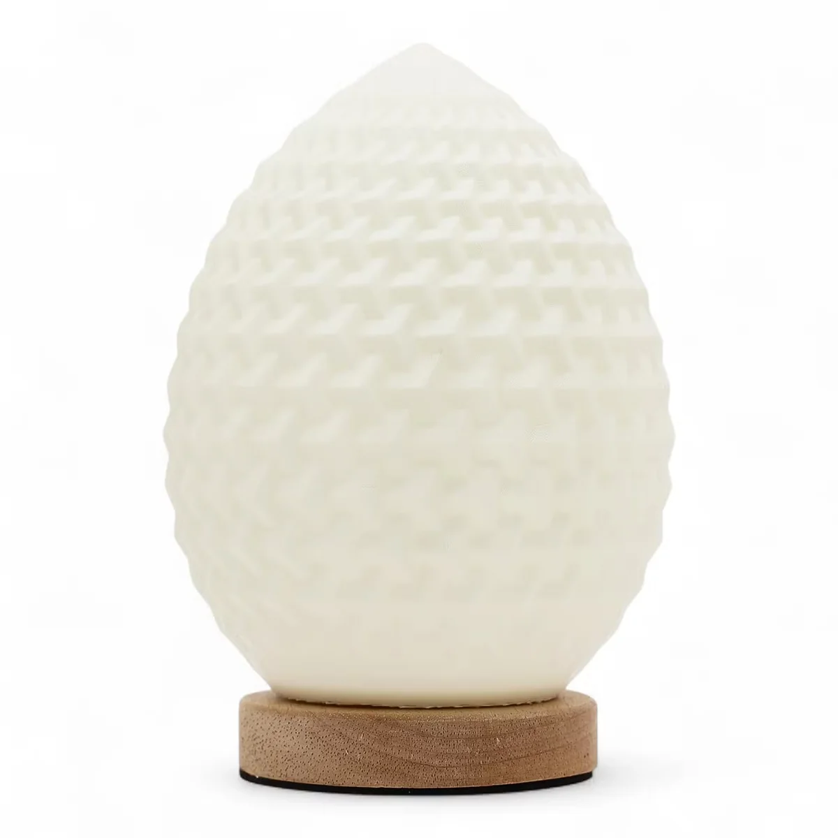 Teardrop shaped lamp with USB connection and three light settings, sleek modern design on plain background