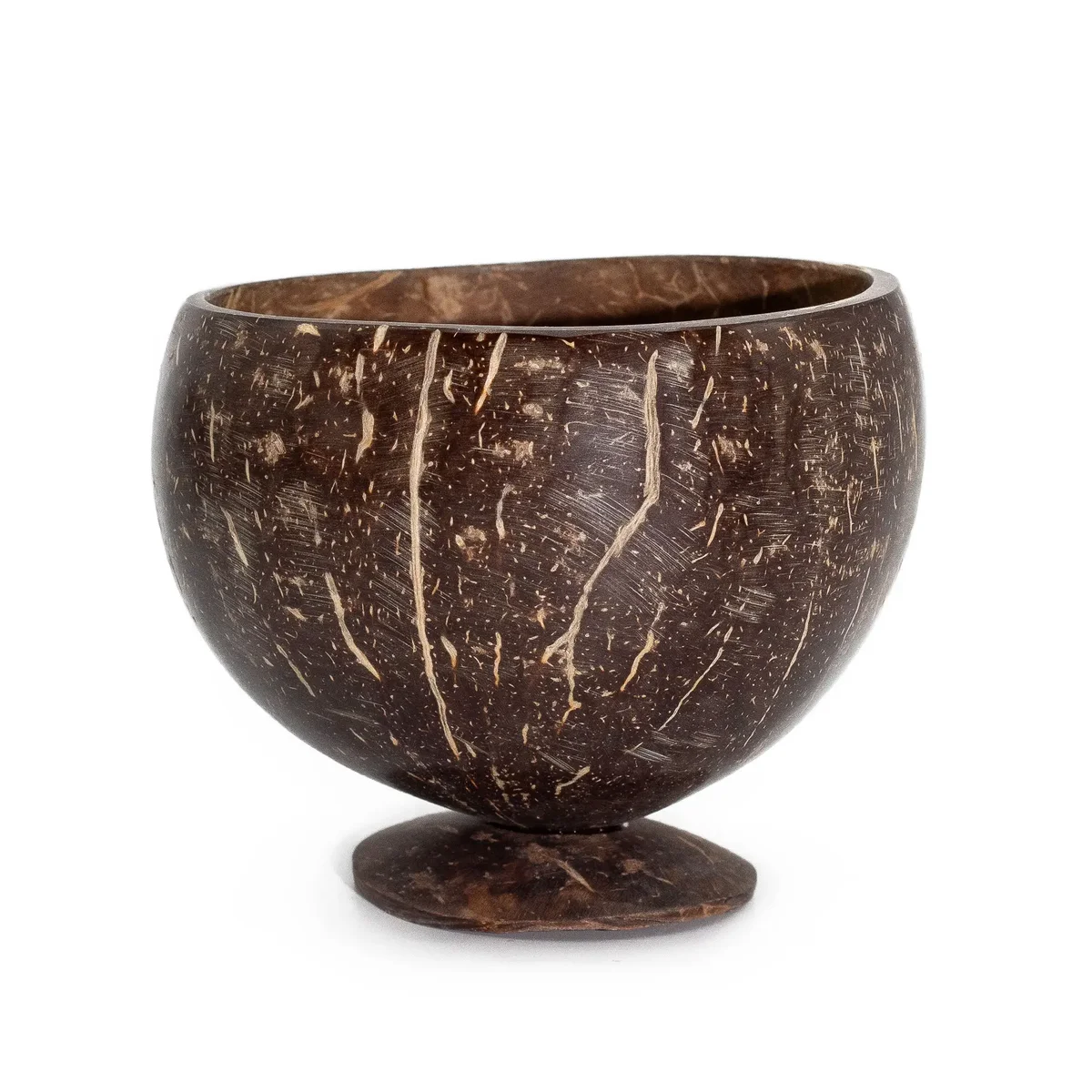 Small natural coconut bowl showing smooth, curved exterior and hollowed interior, ideal for serving or decor.