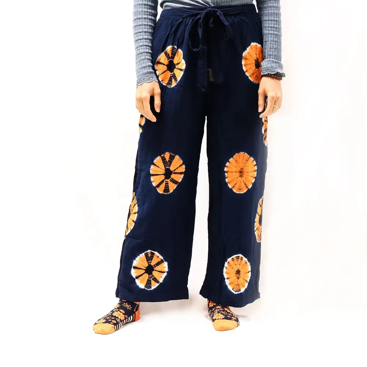 Blue and orange Japanese style comfortable lounge trousers in size large displayed flat on white background