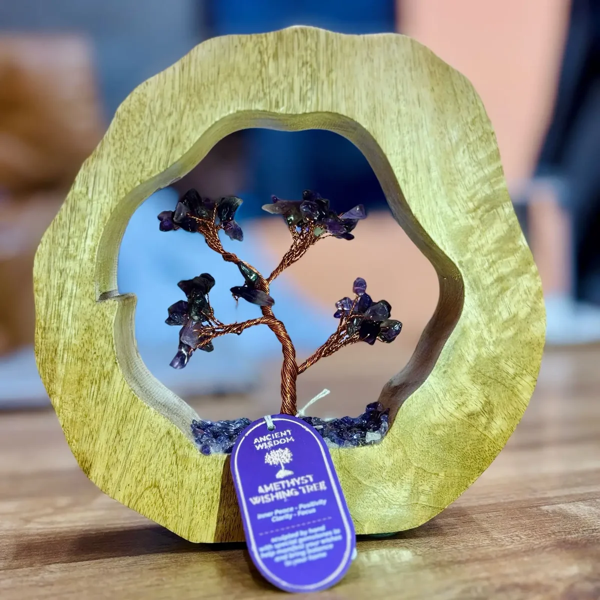 Gemstone tree with 60 amethyst chipstones in a mango wood ring base, decorative mango wood decor piece