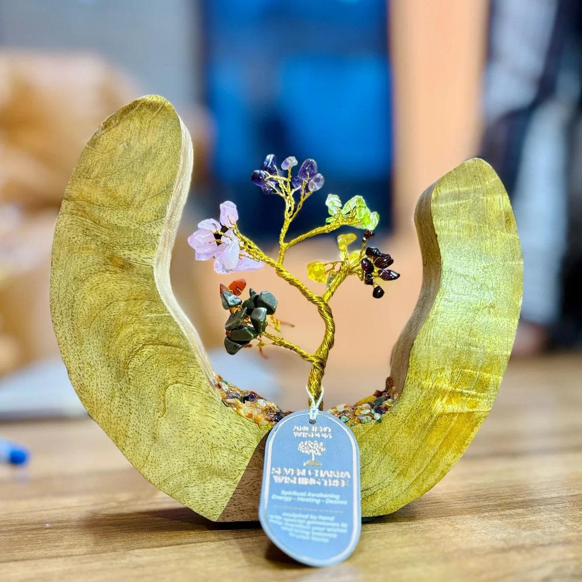 Mango wood chakra ring featuring an open design with a gemstone tree and 60 colorful chipstones representing seven chakras