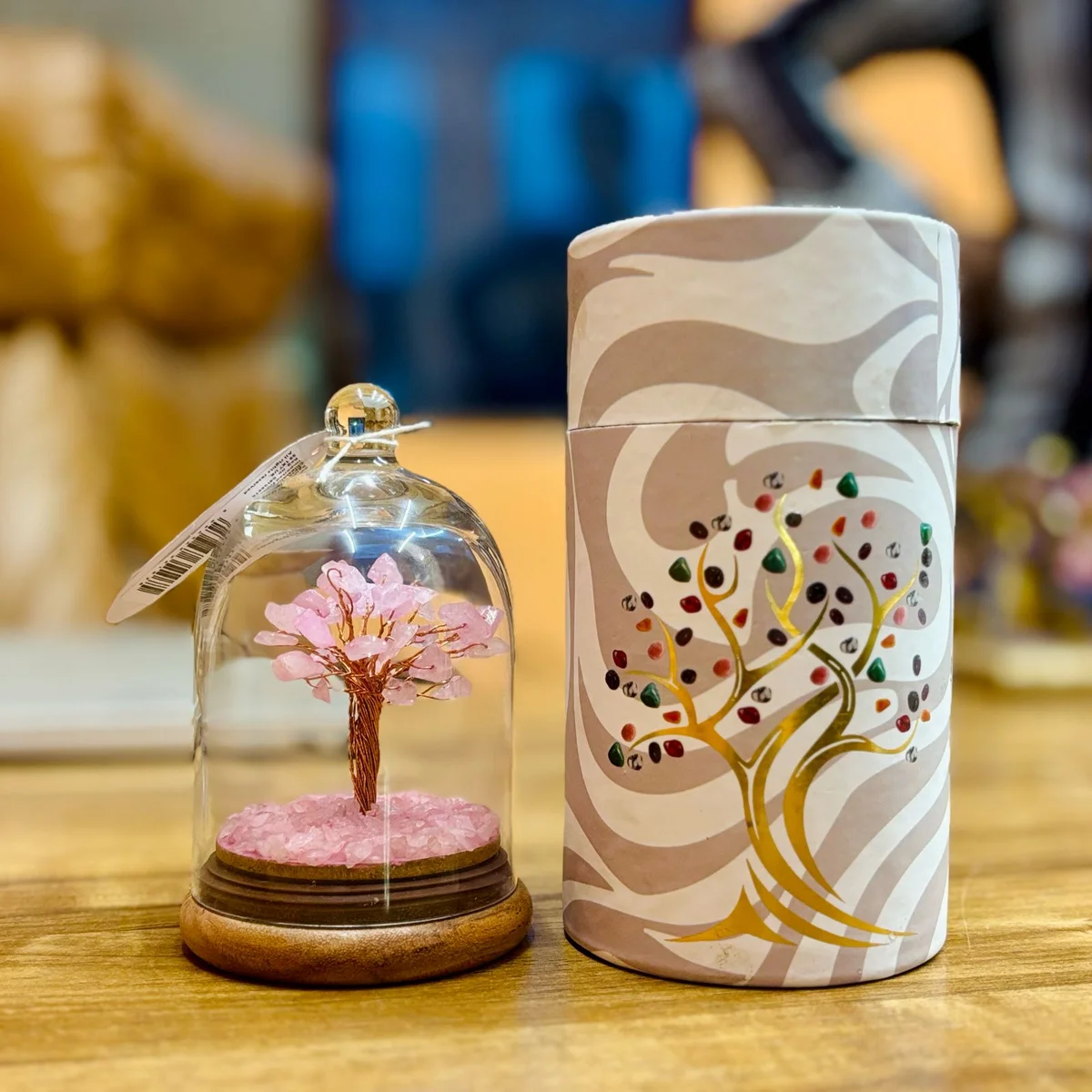 Rose Quartz gemstone dome garden featuring 30 polished chipstones arranged inside a clear dome display