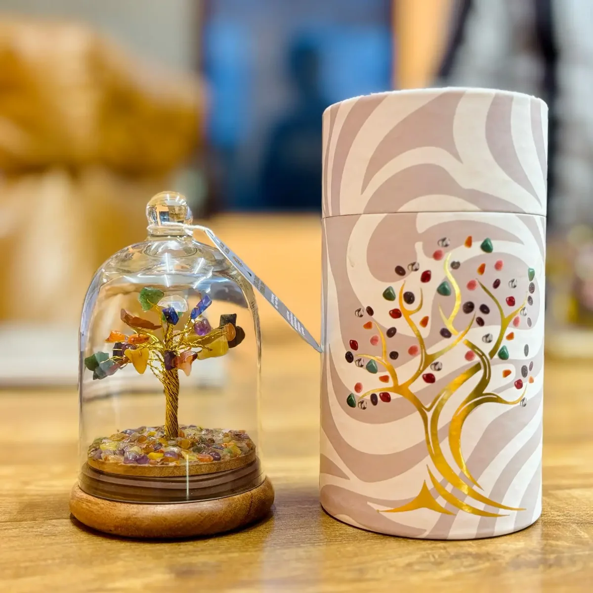 Gemstone dome garden featuring 30 colorful chipstones representing the seven chakras arranged in a dome shape