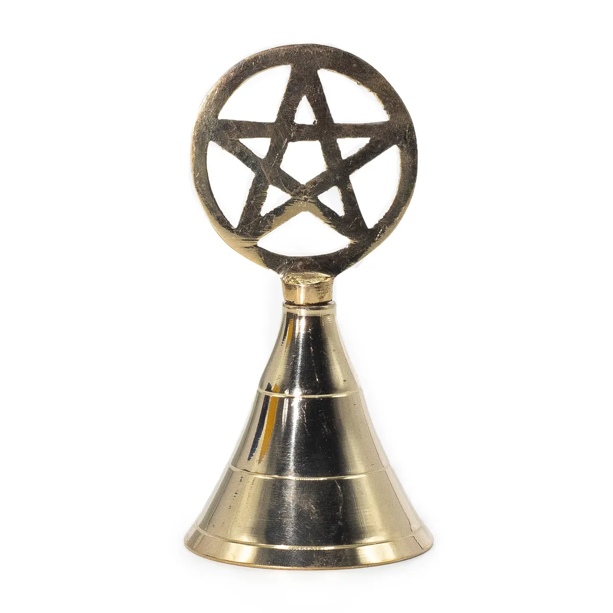 Brass pentagram bell with a star design on the top, used as an altar bell for spiritual practices