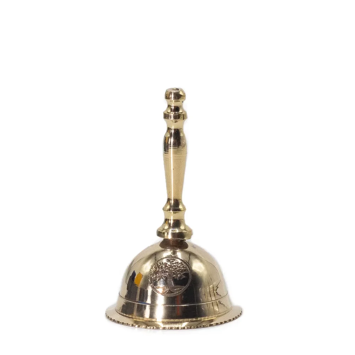 Small brass decorative altar bell featuring an engraved Tree of Life design on its surface