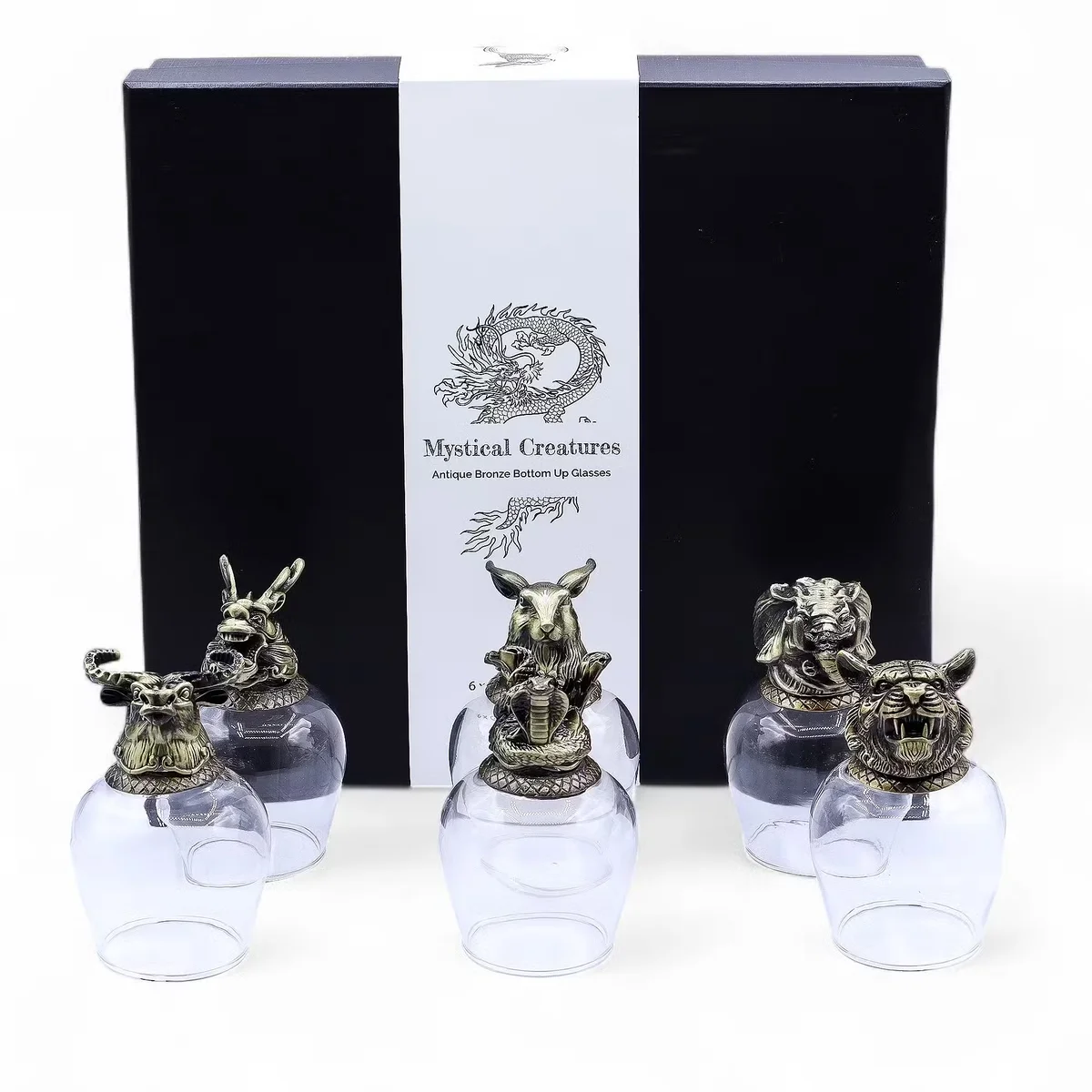 Set of six 100ml drinking glasses with antique bronze mystical creature designs on clear glass