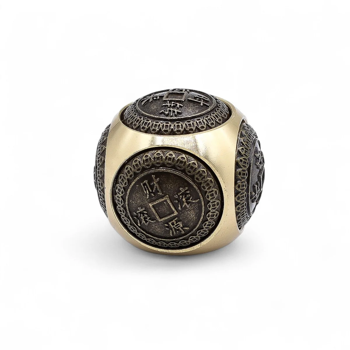 Rounded feng shui wealth dice with engraved symbols used for fortune and wealth enhancement in feng shui practice