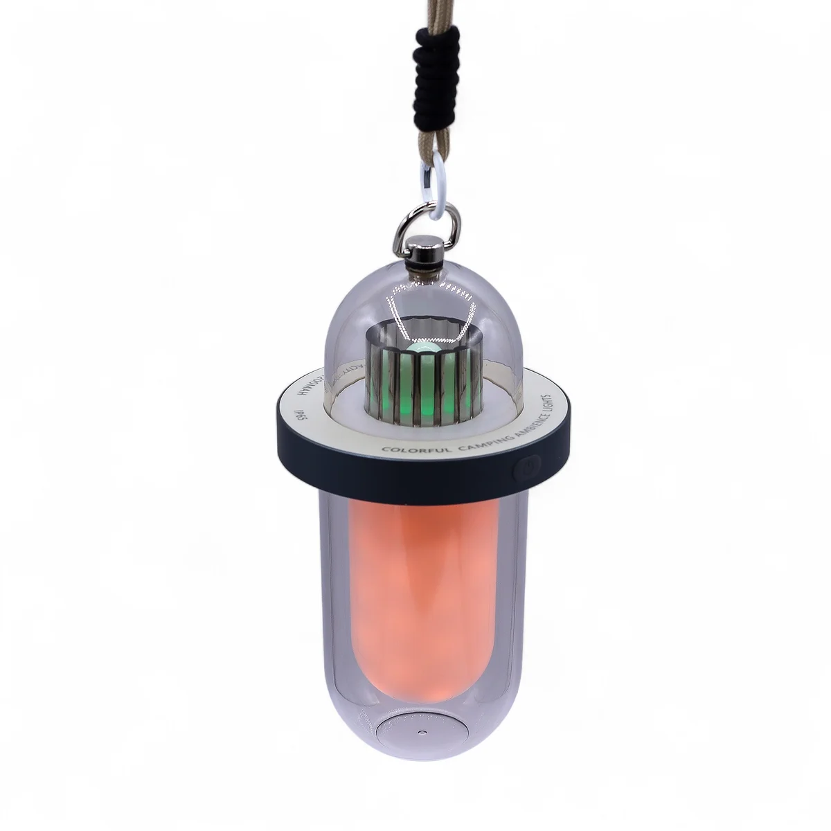 White multi colour outdoor lamp with flame effect, USB-C rechargeable, shown lit on a patio table at dusk