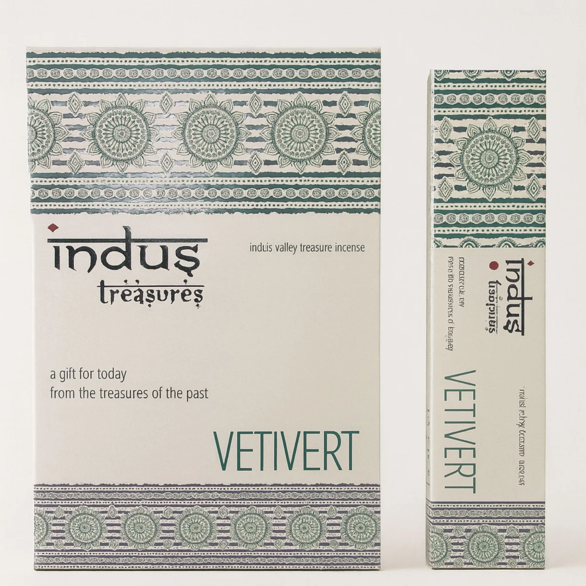 Glass bottle of Indus Treasures vetivert essential oil, 15gms, amber liquid.