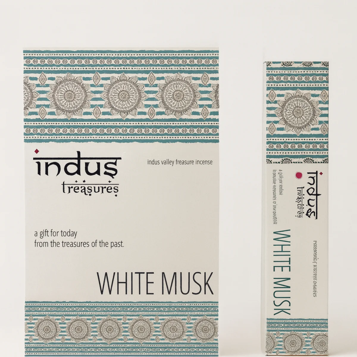 White glass bottle of Indus Treasures musk oil (White Musk) 15g.