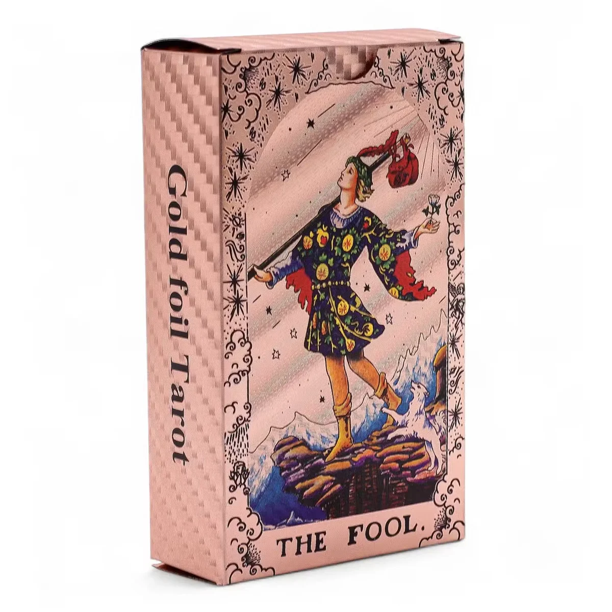 Rose gold foil tarot deck spread showing moon phase designs with accompanying instructional booklet on white background