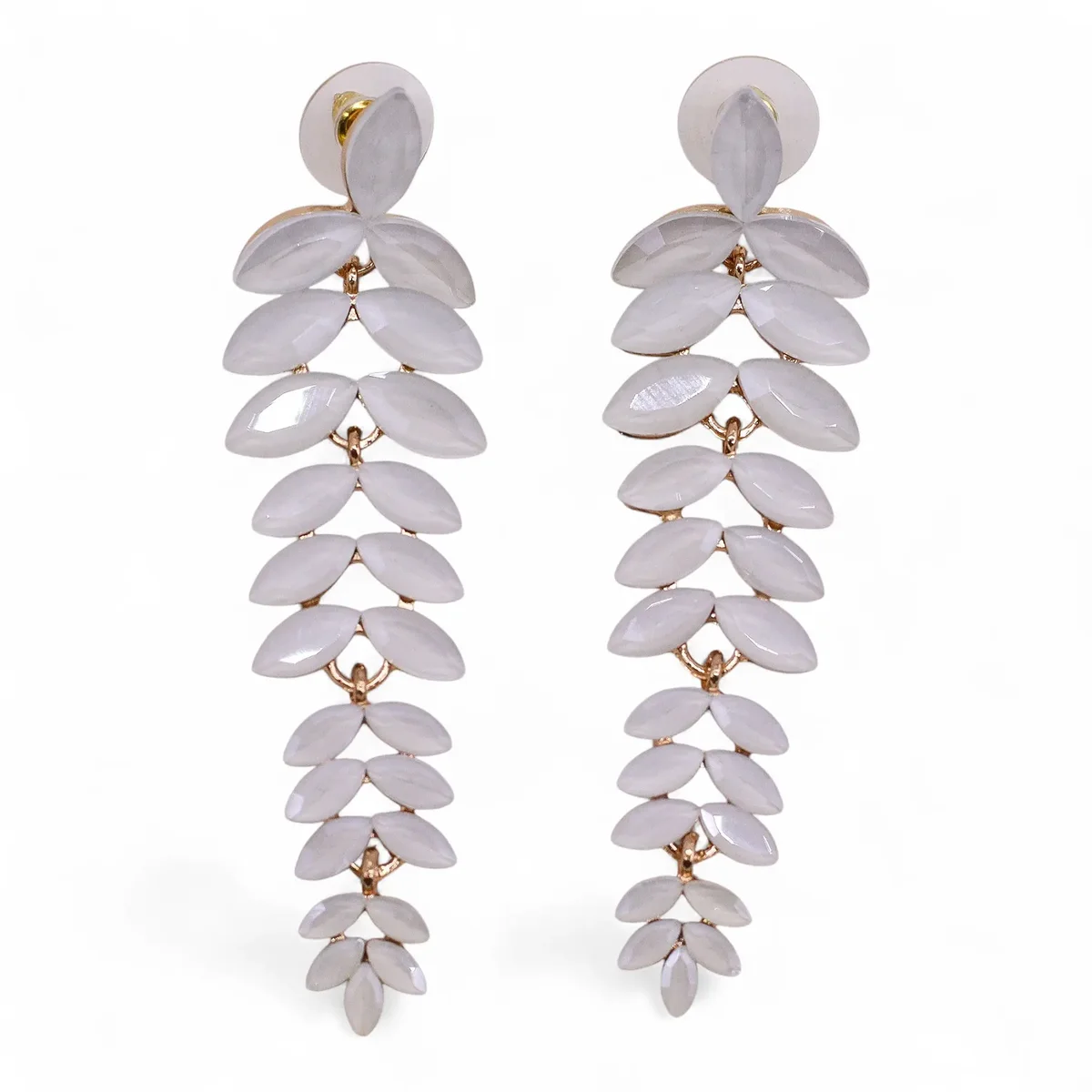 Pair of pearl vintage glass long drop earrings with silver hooks on a white background