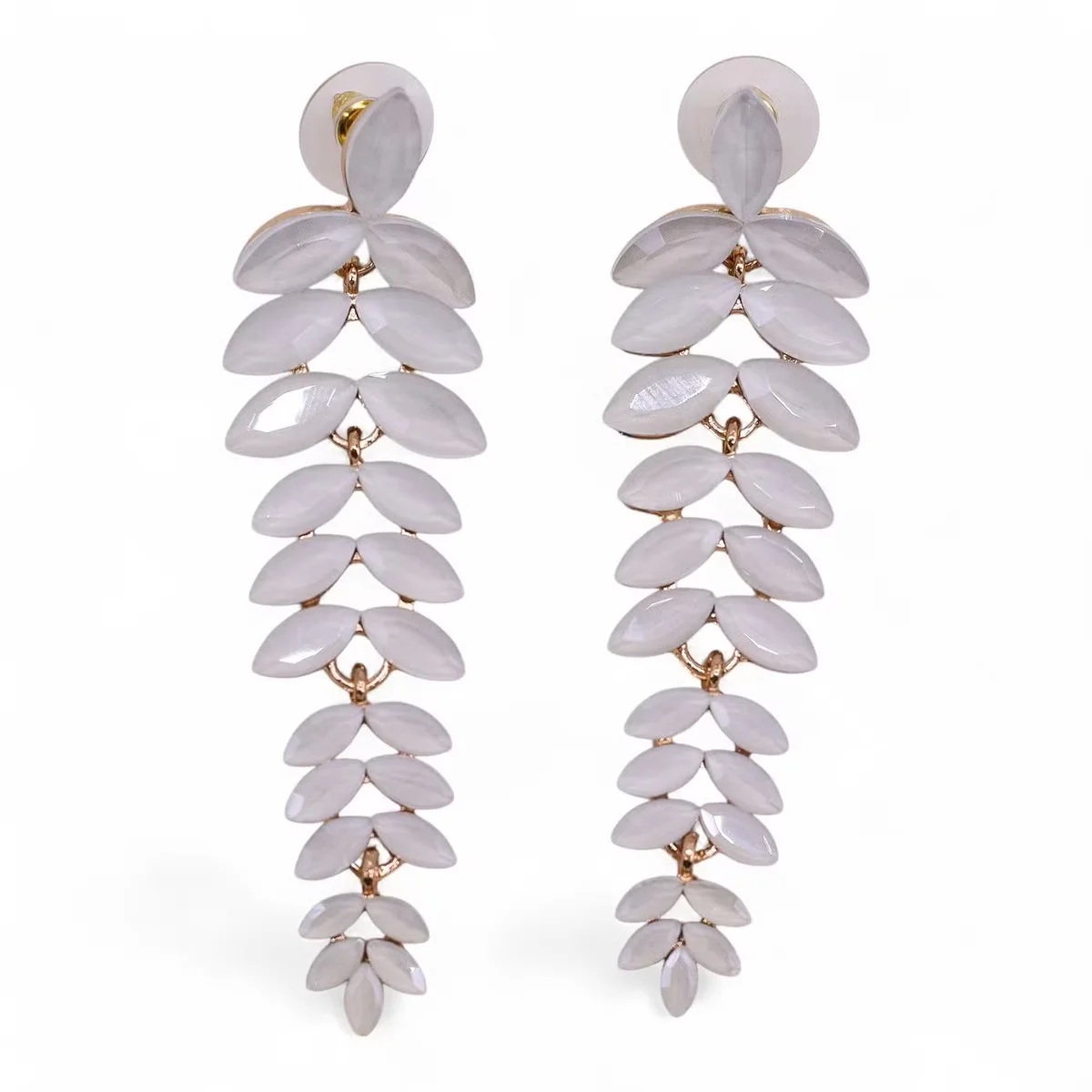 Long drop earrings with vintage glass pearls, showcasing elegant vintage style jewellery design on white background