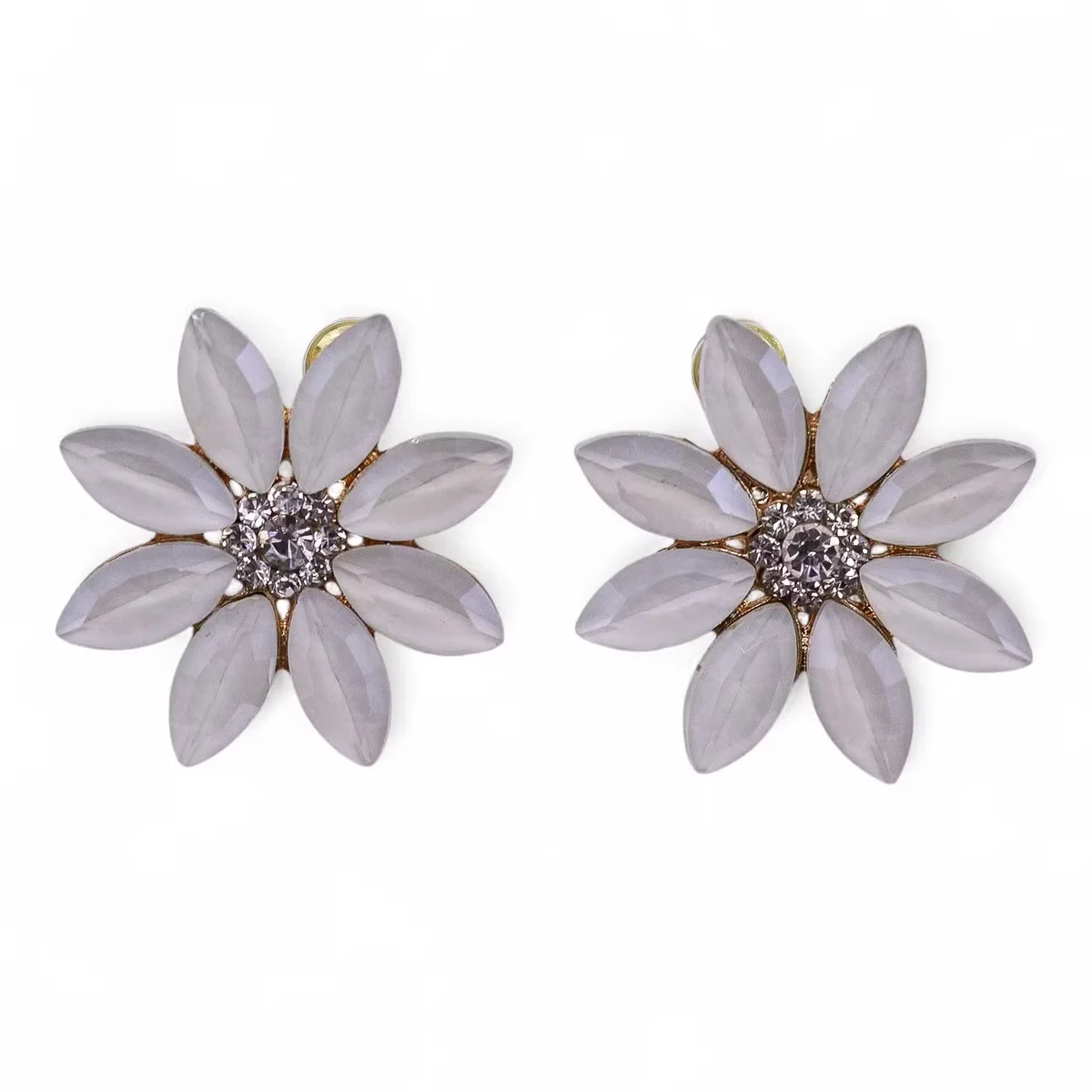 Close-up of Pearl vintage style earrings featuring glass flowers on a white background