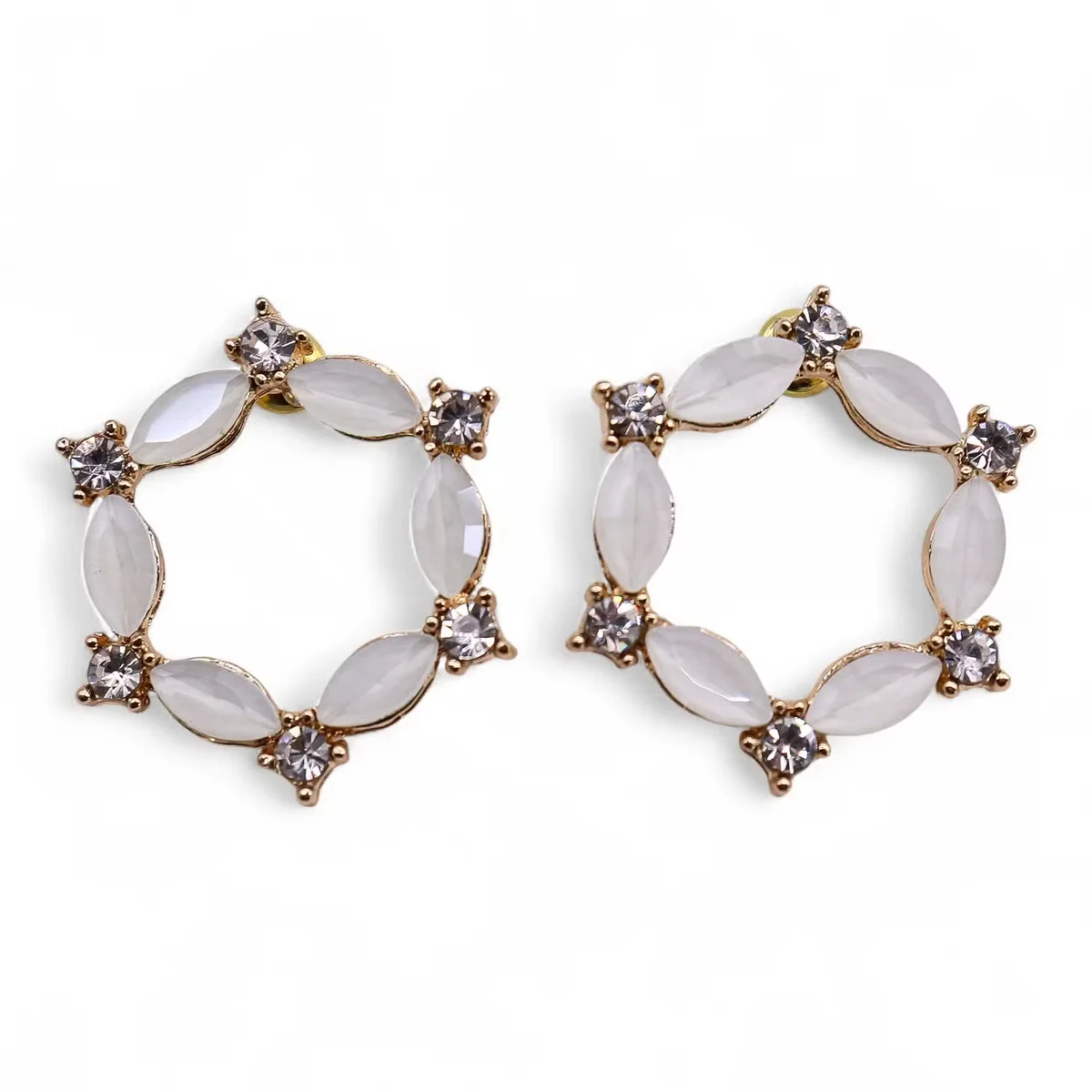 Pearl vintage glass loop earrings displayed on a white background, showing their delicate loop design and pearl detail