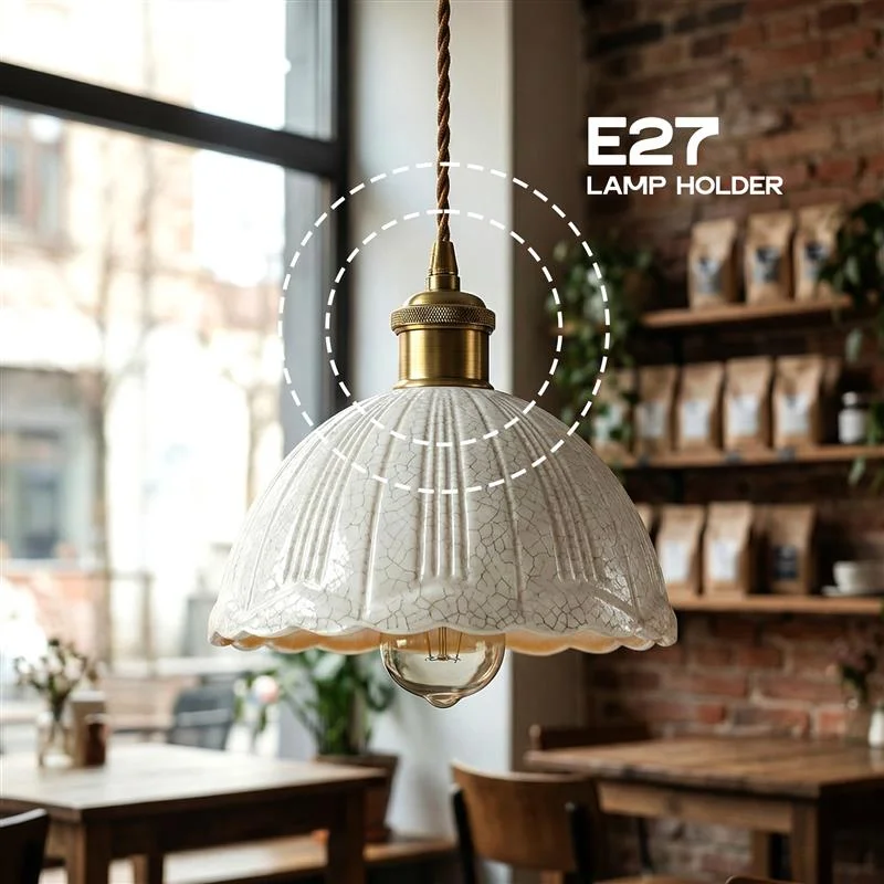 White crackle glass scalloped pendant with brass hardware and fabric cord, vintage style ceiling light hanging in room