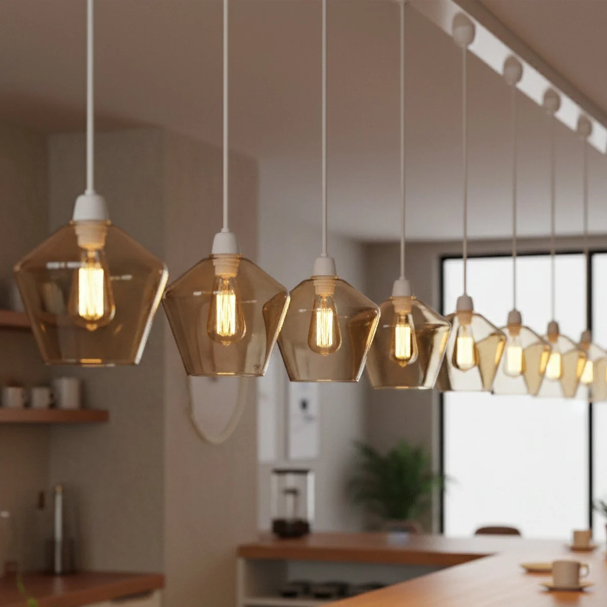 Diamond-shaped amber geometric glass pendant shade with faceted design and warm cognac tint on white background