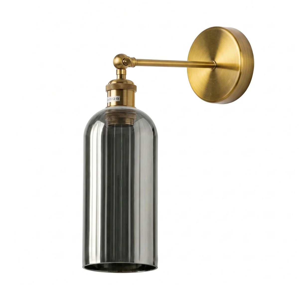 Adjustable vintage brass bedside reading lamp with smoked grey glass shade mounted on wall with swing arm