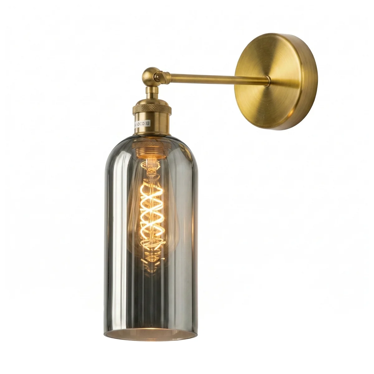 Adjustable vintage wall sconce with yellow brass finish and smoked grey glass shade mounted on wall with 180° swing arm