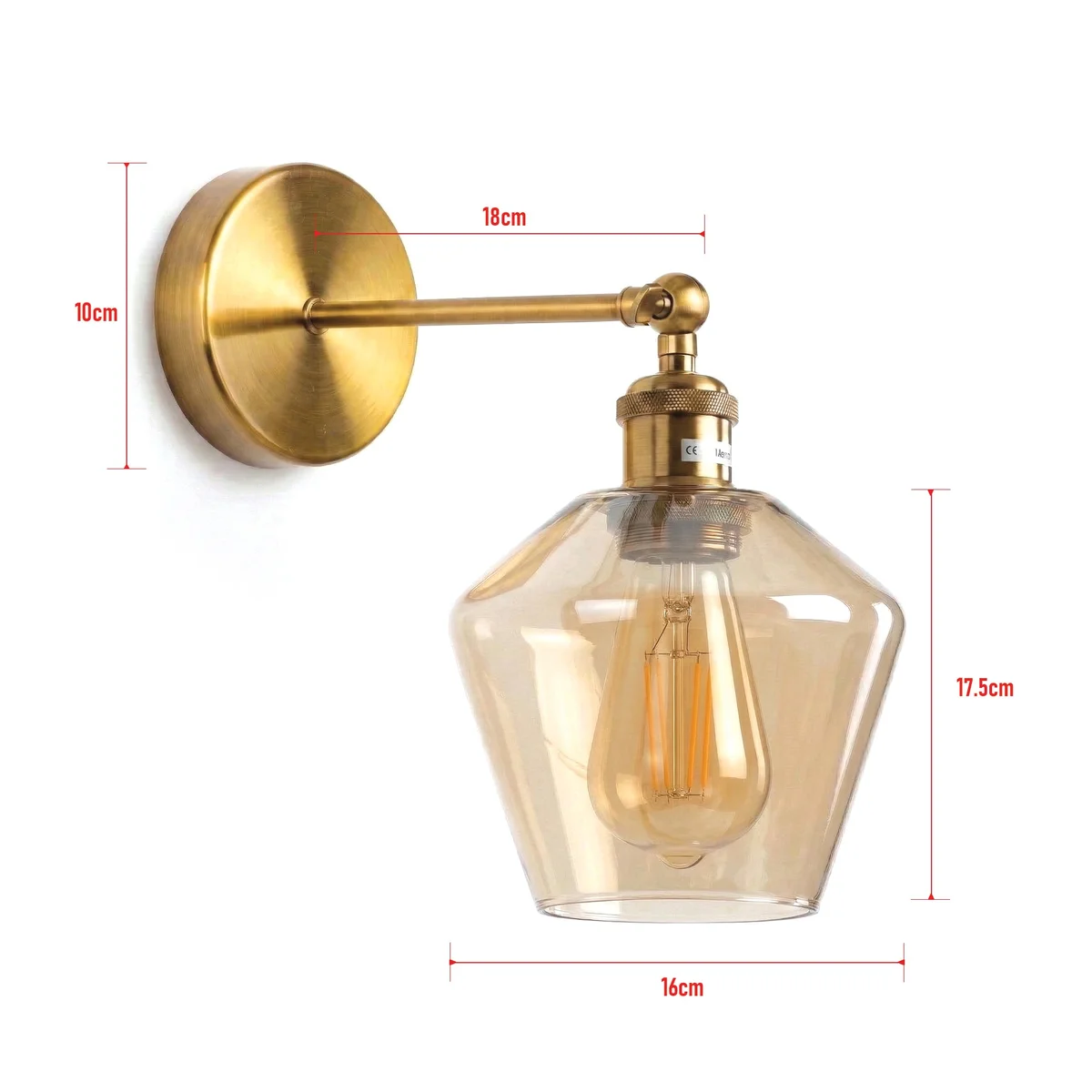 Vintage brass amber glass wall light with faceted cone shade and adjustable swing arm mounted on wall