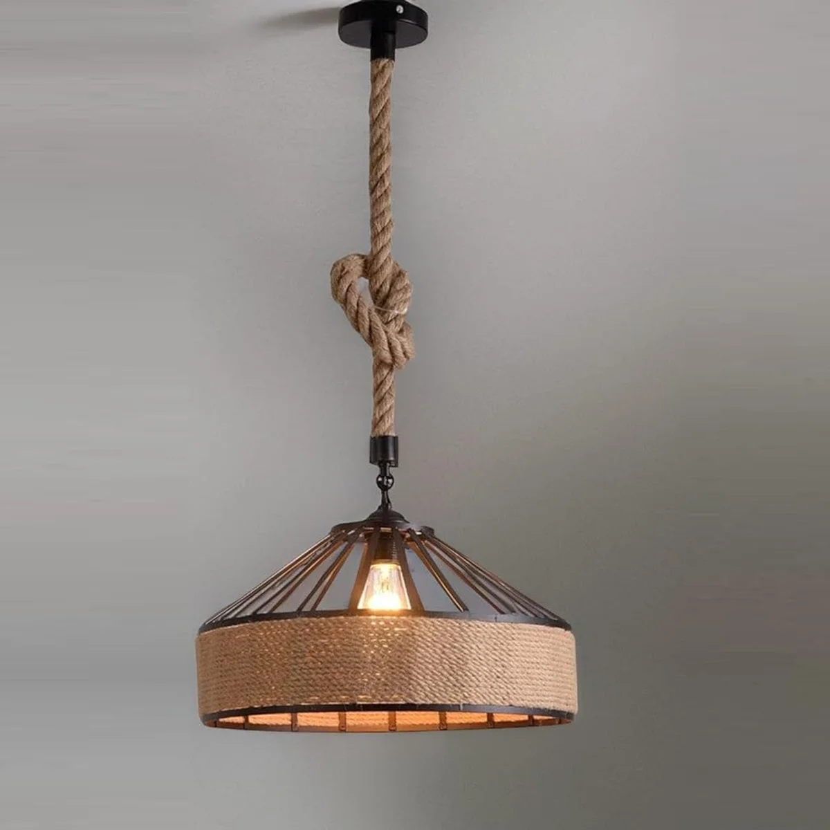 Large hemp rope pendant light with metal cage hanging, ideal for cafe pendant lighting and rustic décor settings