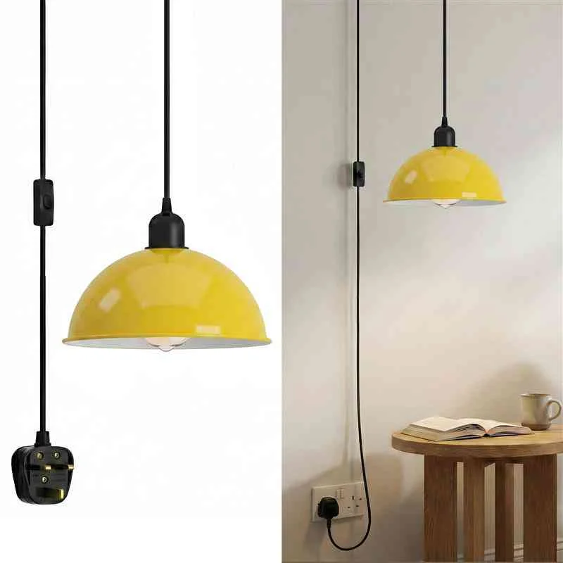 Black metal pendant light with large 21cm shade and 4m cord hanging in a modern industrial styled room