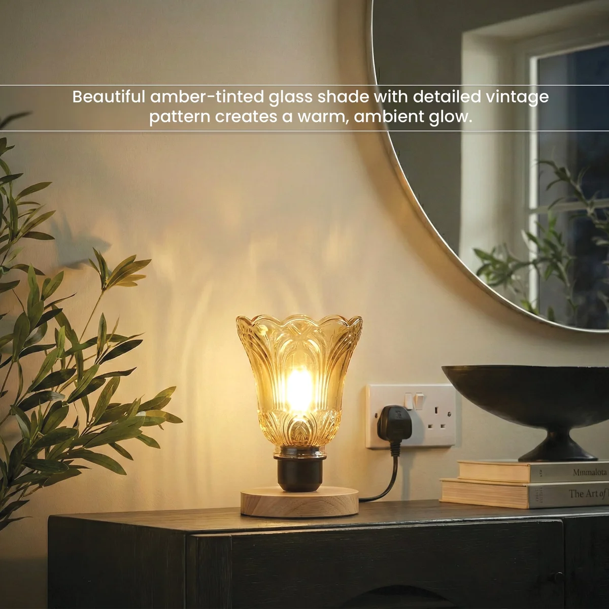 Vintage glass table lamp with warm brown textured shade and natural wooden base on a white surface with soft lighting