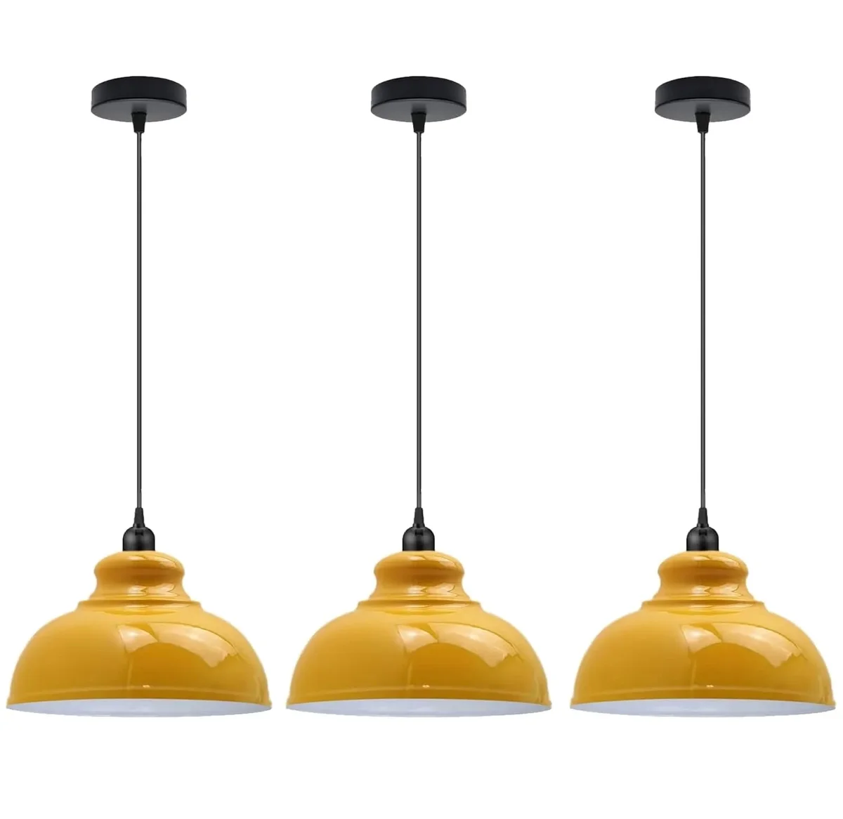 Three metal dome 3 pack pendant lights hanging at different heights with brushed brass finish over kitchen island