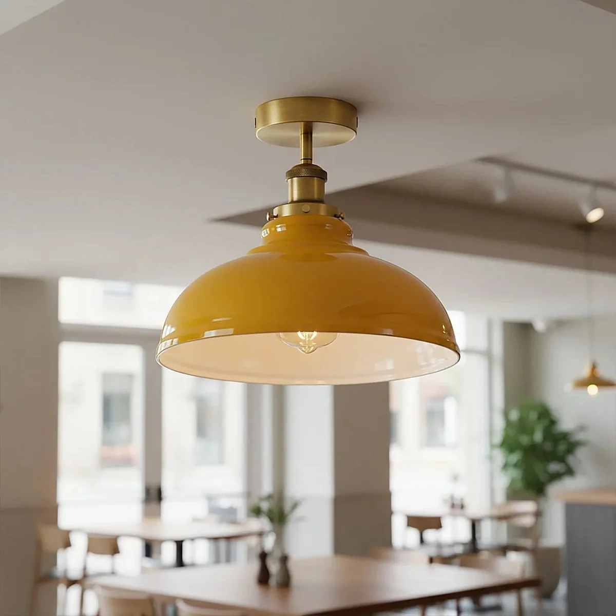 Vintage kitchen ceiling light with rust-resistant metal conical shade and semi-recessed design, shown installed over sink