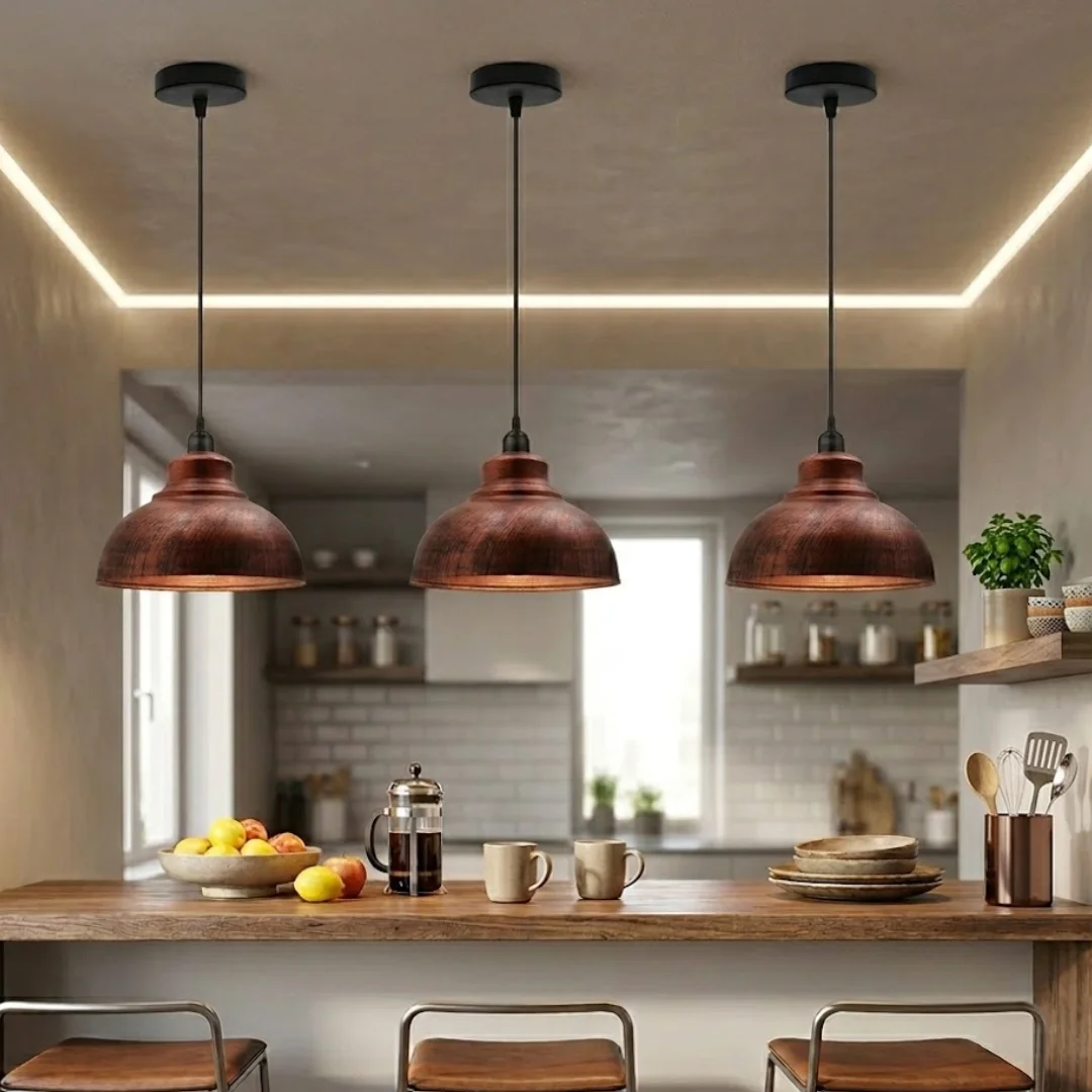 Three modern metal 3 pack pendant lights with curved shades hanging at different heights, shown in brushed brass finish