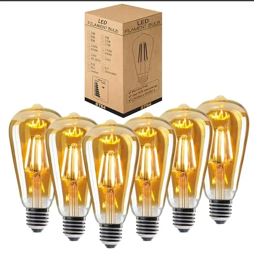 Set of 24 warm white E27 LED Edison bulbs with vintage ST64 tear drop design, glowing softly with amber light