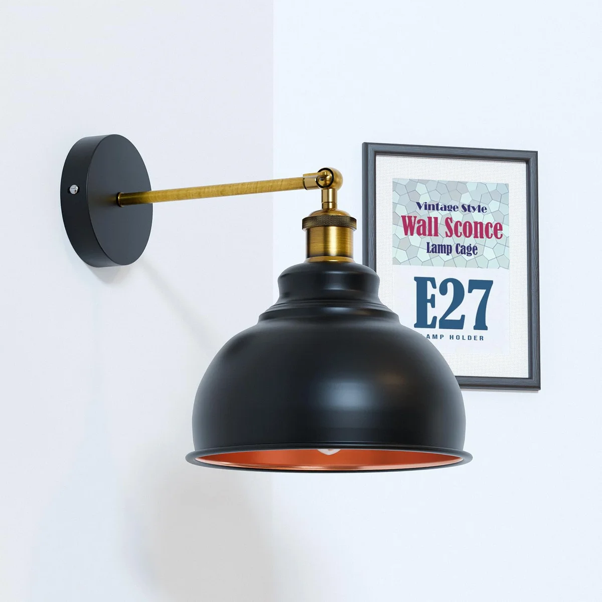 Matte black industrial wall sconce with adjustable arm and dome shade mounted on a wall in a modern interior setting