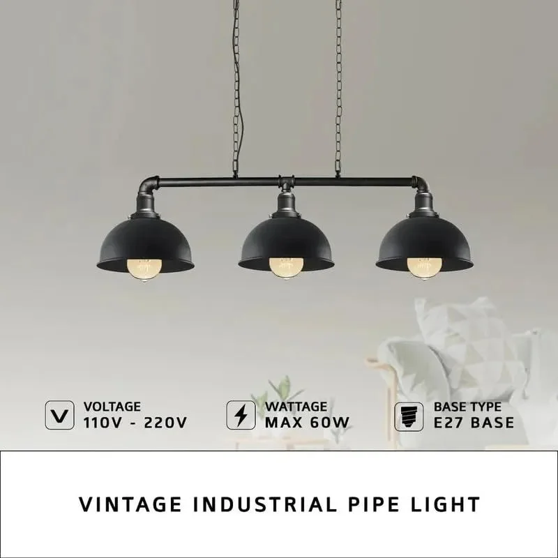 Rustic metal pendant lamp with three red metal pipe sconce cups hanging from ceiling in industrial steampunk style