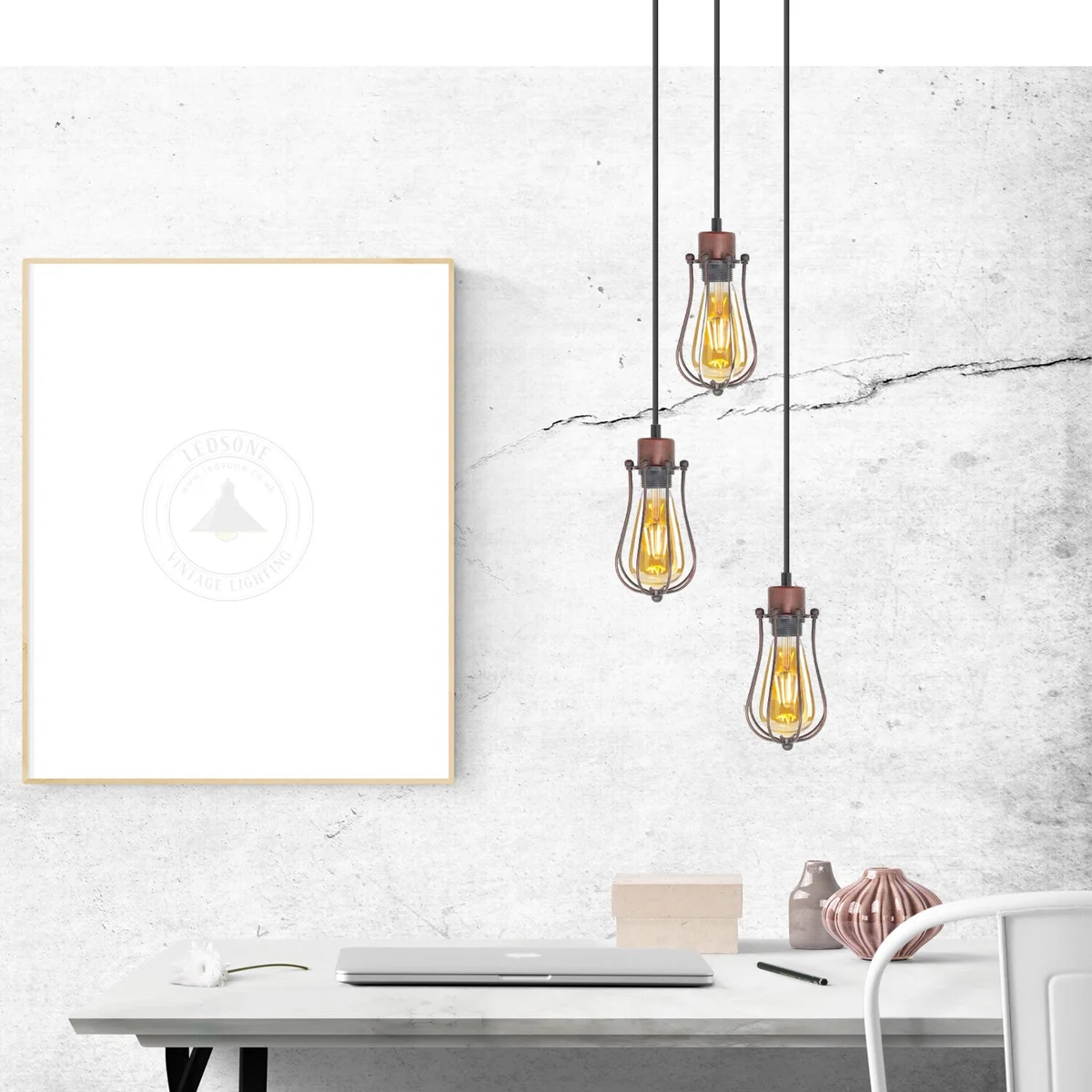 Vintage industrial ceiling pendant light with three balloon-shaped metal wire cage shades hanging from round ceiling plate