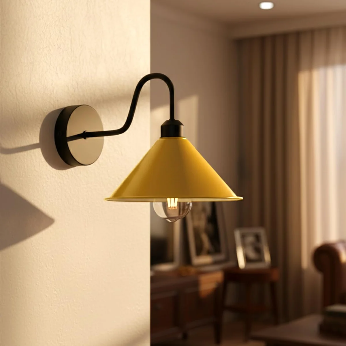 Retro wall lamp with orange cone shade and black swan neck arm, mounted on a white wall indoors.