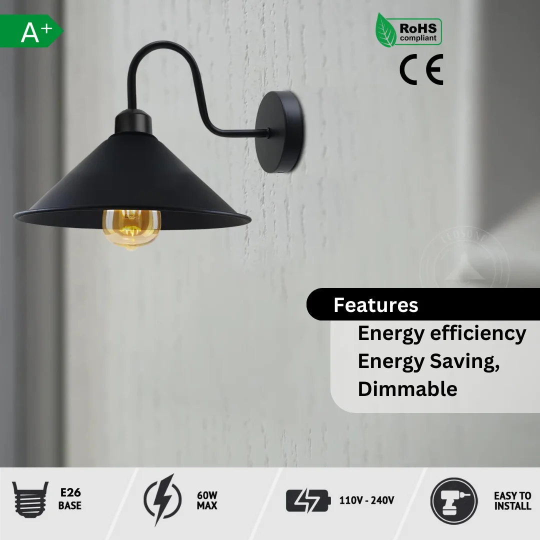 Orange cone indoor wall sconce with black antique swan neck arm and 22cm diameter shade mounted on a wall