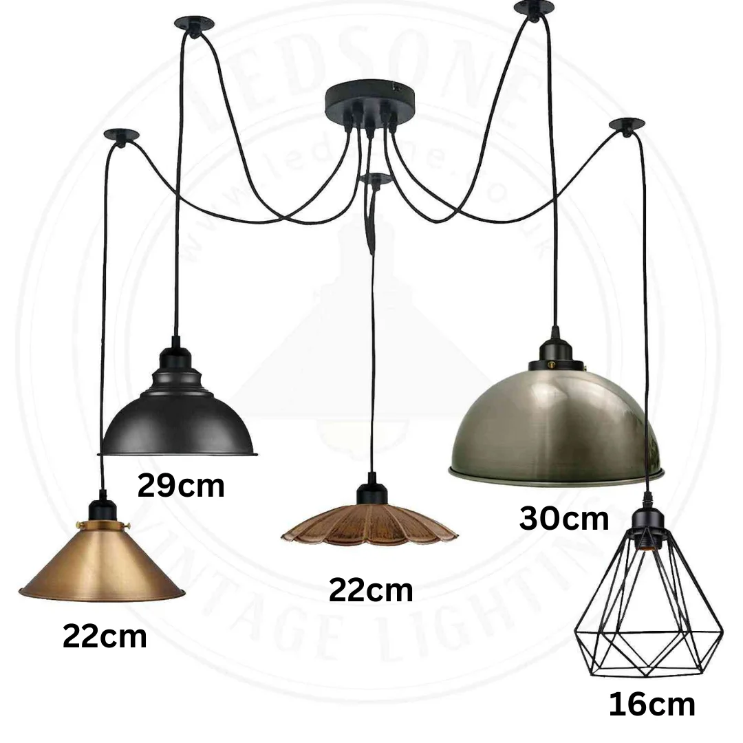 Black 5-light vintage spider chandelier with adjustable arms and long cables hanging in industrial style setting