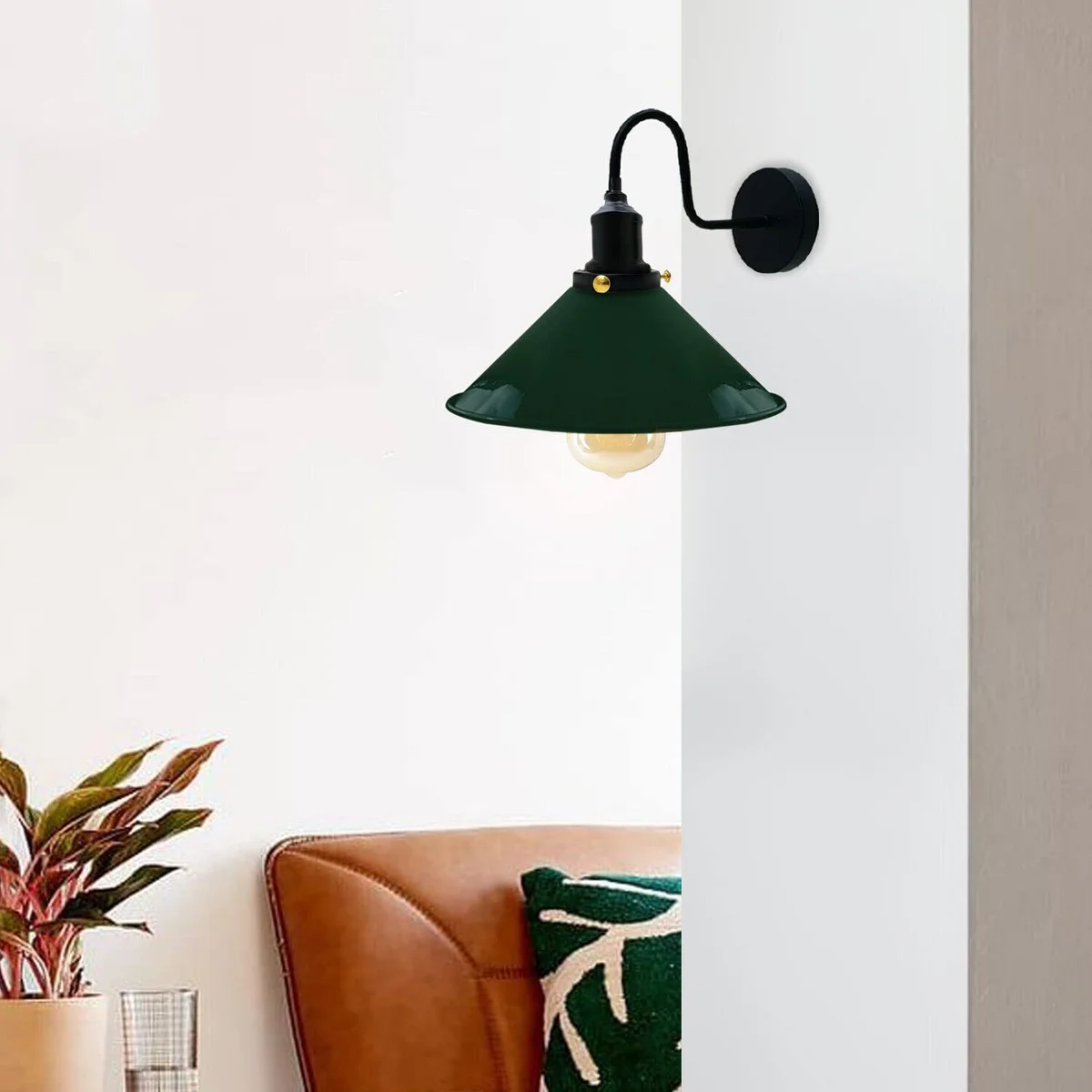 Vintage industrial wall sconce with adjustable metal cone shade in black finish, mounted on a white wall with E27 bulb included