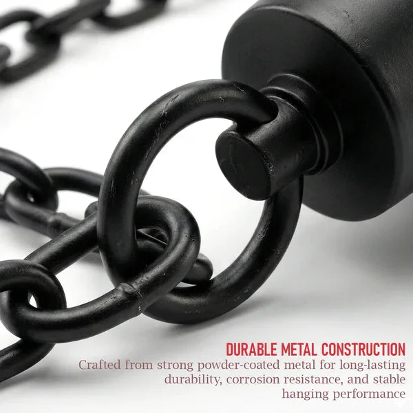 Three black metal pendant lights with clear glass shades hanging in a row, showcasing vintage industrial design