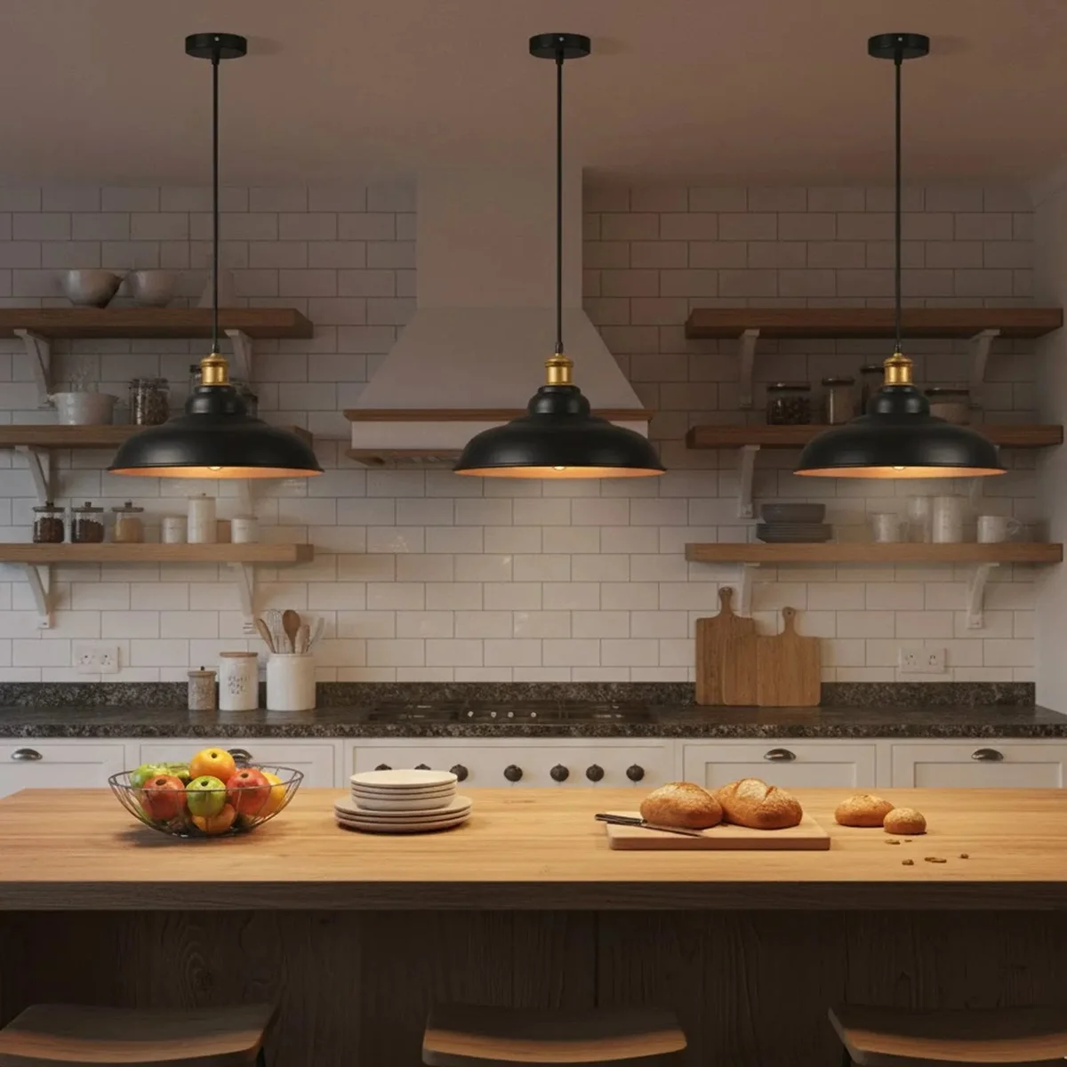 Three black pendant light fittings with metal shades and gold interiors hanging against a white background