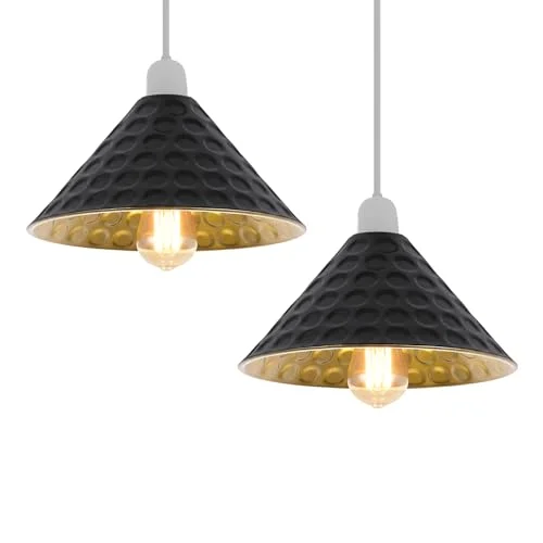 Black and gold lampshade with matte black exterior and gold interior, cone-shaped metal design, shown hanging in a set of three
