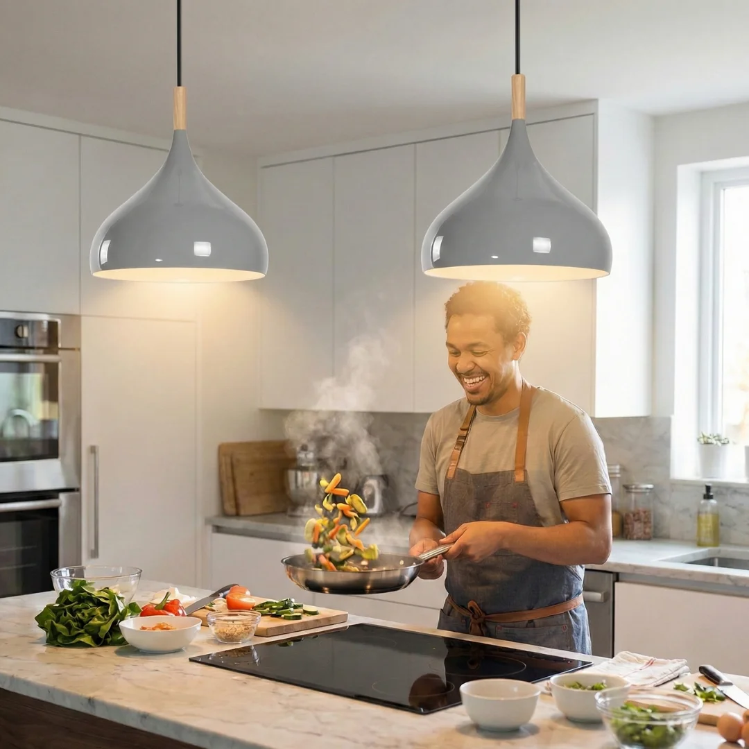 Two white metal barn shade industrial ceiling lights with adjustable cables hanging against a white background