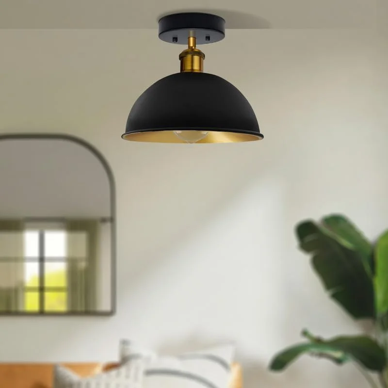 Black and gold dome retro ceiling light with metallic finish, 21cm wide, shown installed in a modern vintage room setting