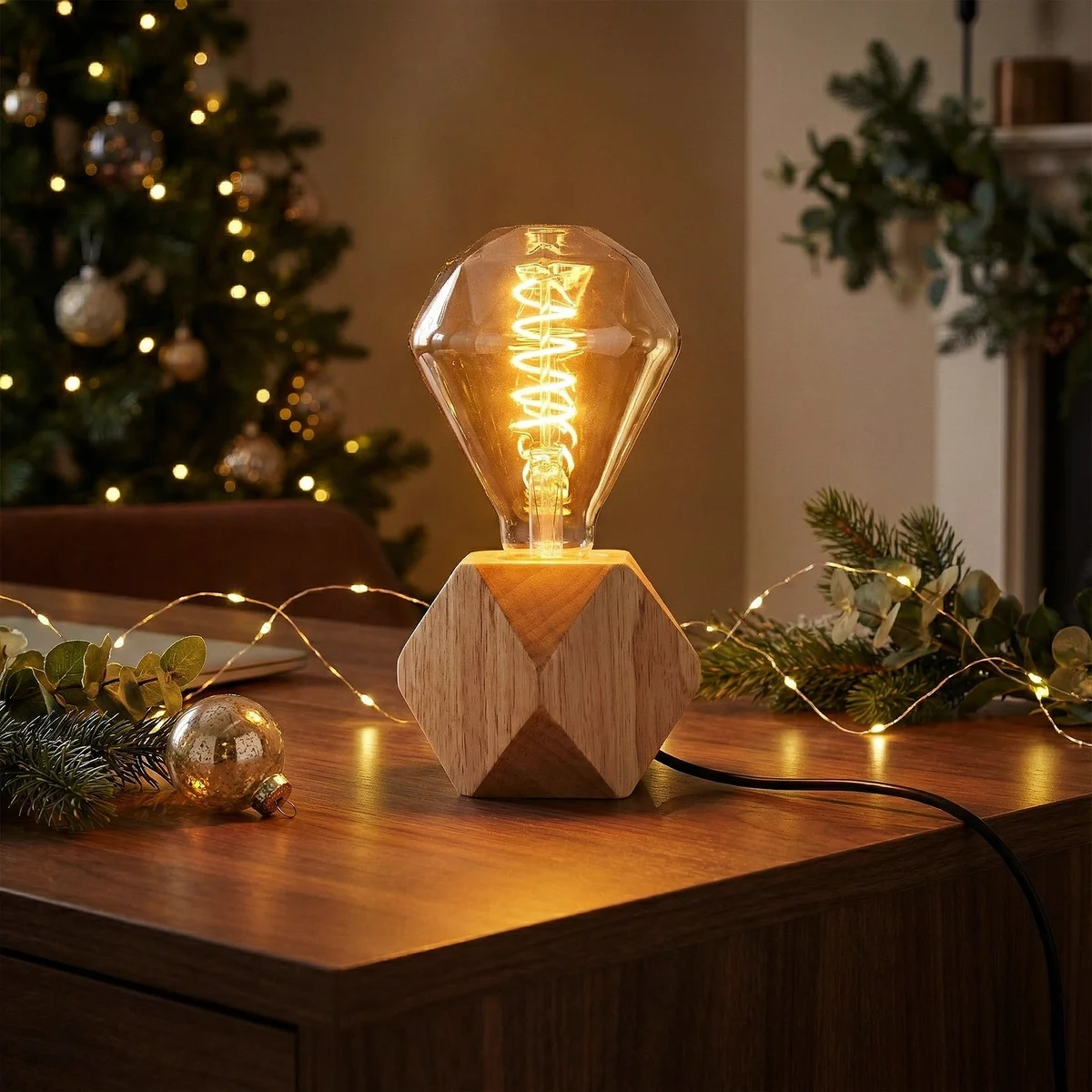 Small LED table lamp with natural wood base and decorative bulb, featuring UK plug table lamp with inline switch on desk