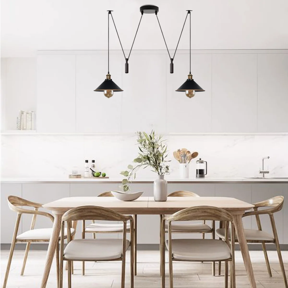 Black 2 light pendant lamp with metal shades and long cables, designed for ceiling mounting in modern interiors
