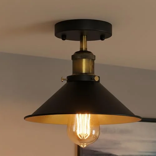 Vintage ceiling light with metallic cone shade mounted flush on white ceiling in a modern industrial style room setting