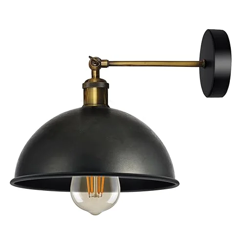 Black metal farmhouse wall sconce with dome-shaped cage shade mounted on a wall with visible mounting hardware