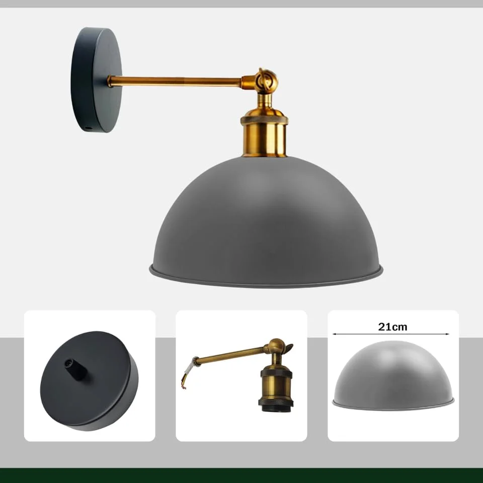 Farmhouse wall sconce with black metal dome shade and cage design mounted on wall with visible mounting hardware